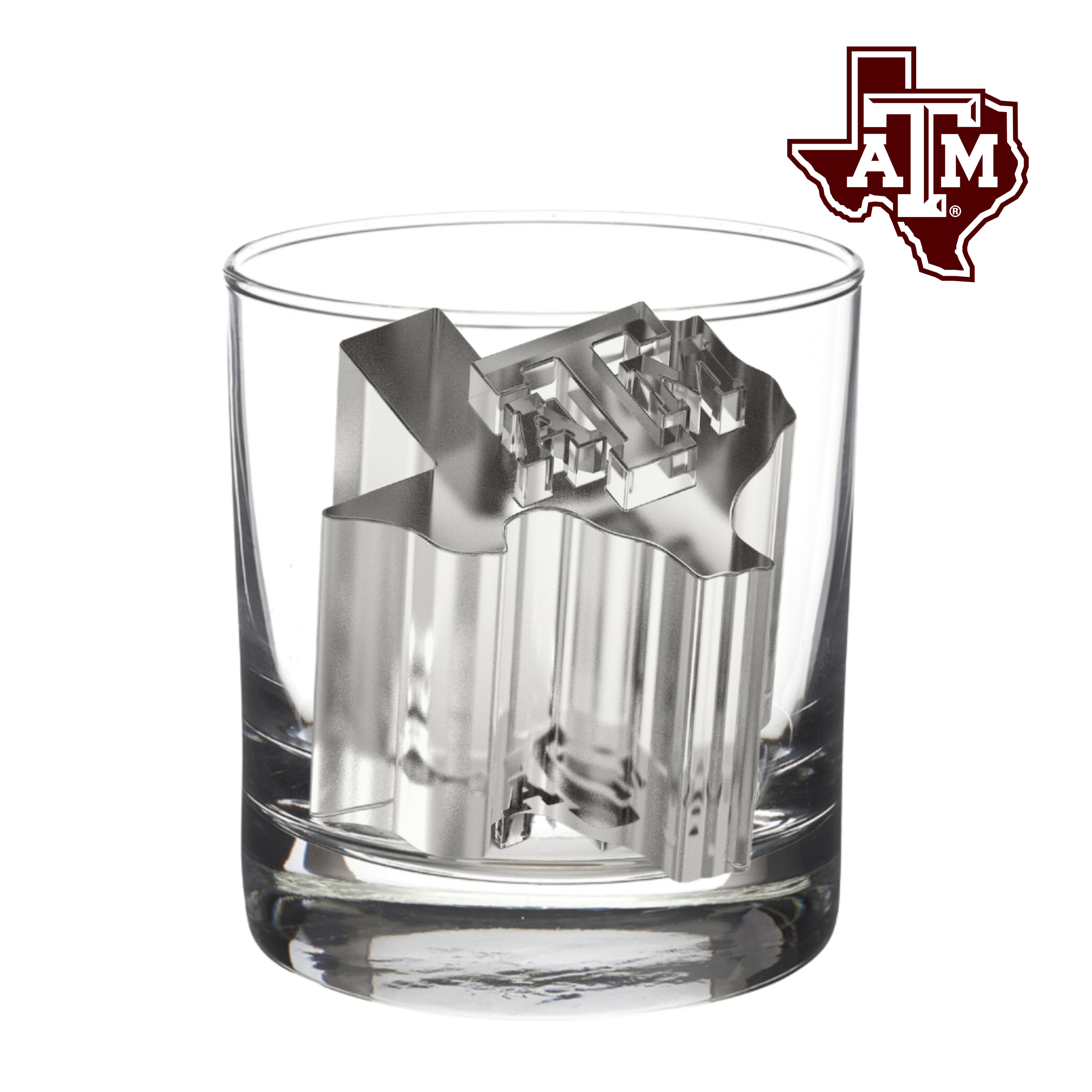 Clear glass with metal ice cube and Texas A&M logo in the corner
