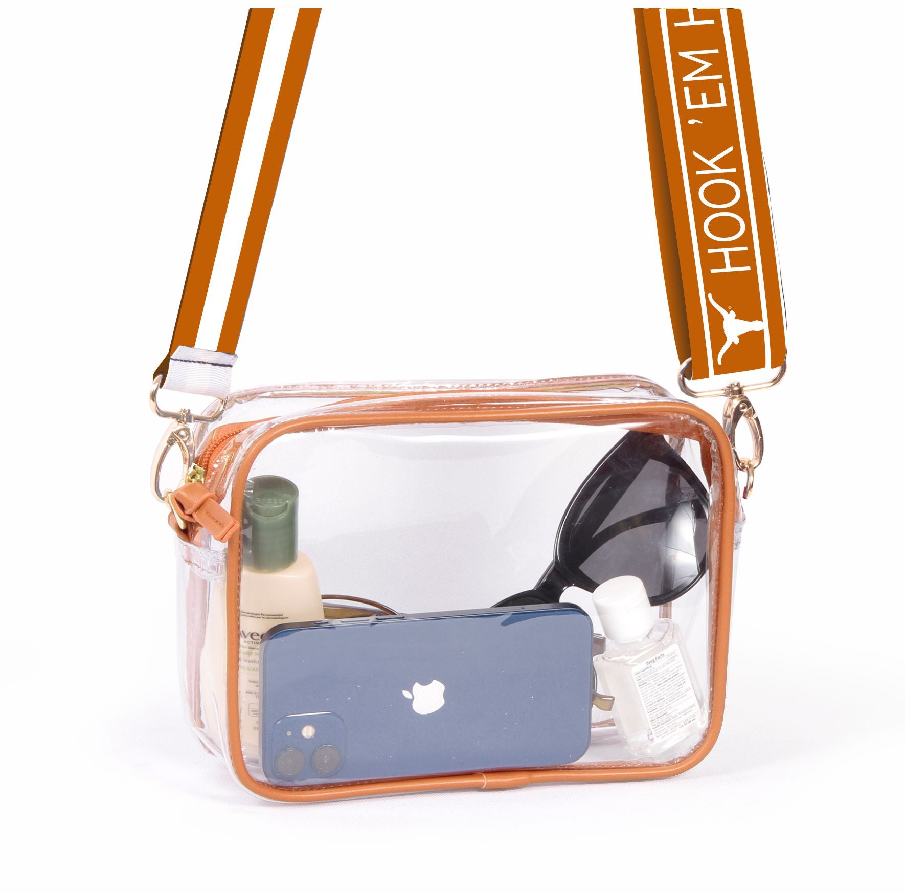 A clear vinyl purse with orange vegan leather accents and brass hardware. The purse is displayed with one adjustable shoulder strap with 'HOOK 'EM' text and an orange design.